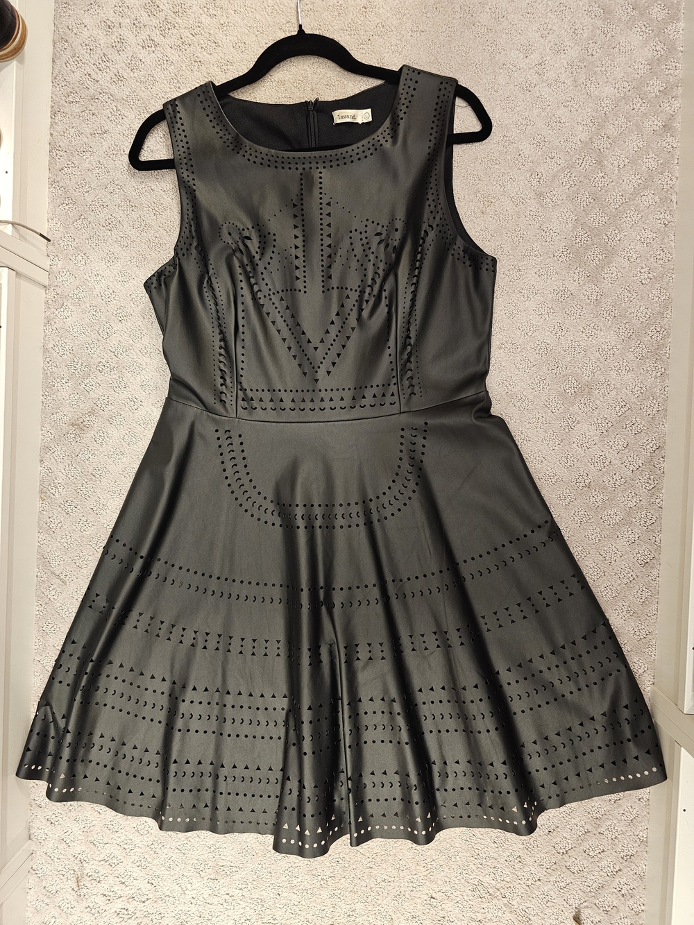 Sleeveless Black Laser-Cut Midi Dress with Flared Skirt